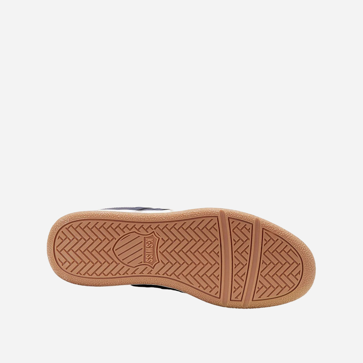 Navy blue sneaker with white sole on a light gray background