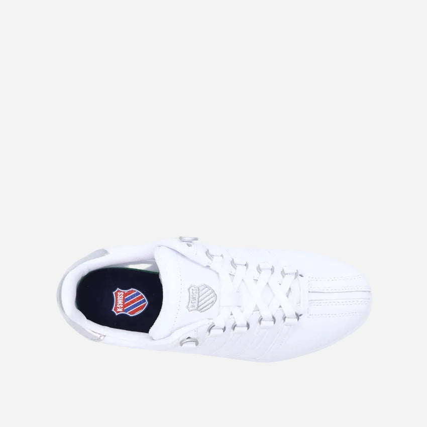 White sneaker on a light beige background